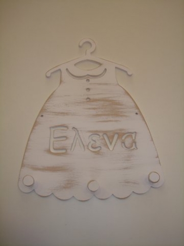 Hand-painted wooden hanger “dress”.