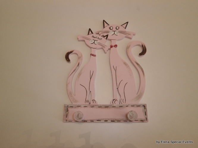Hand-painted wooden hanger “cats”.