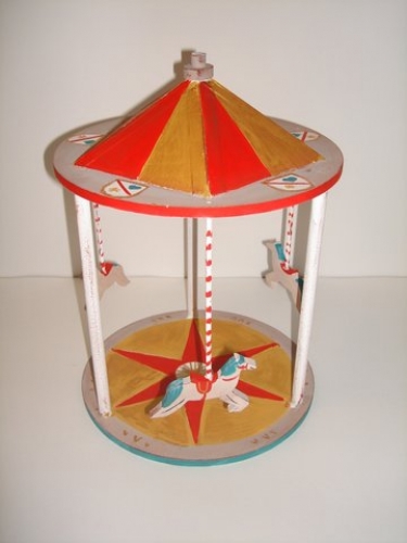 Hand-painted wooden 3-dimension carousel.
