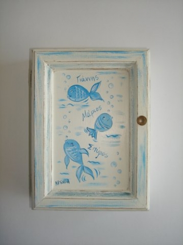 Hand-painted wooden key hanger.