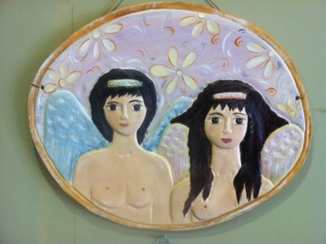 Hand-painted Ceramic Repousse plate.