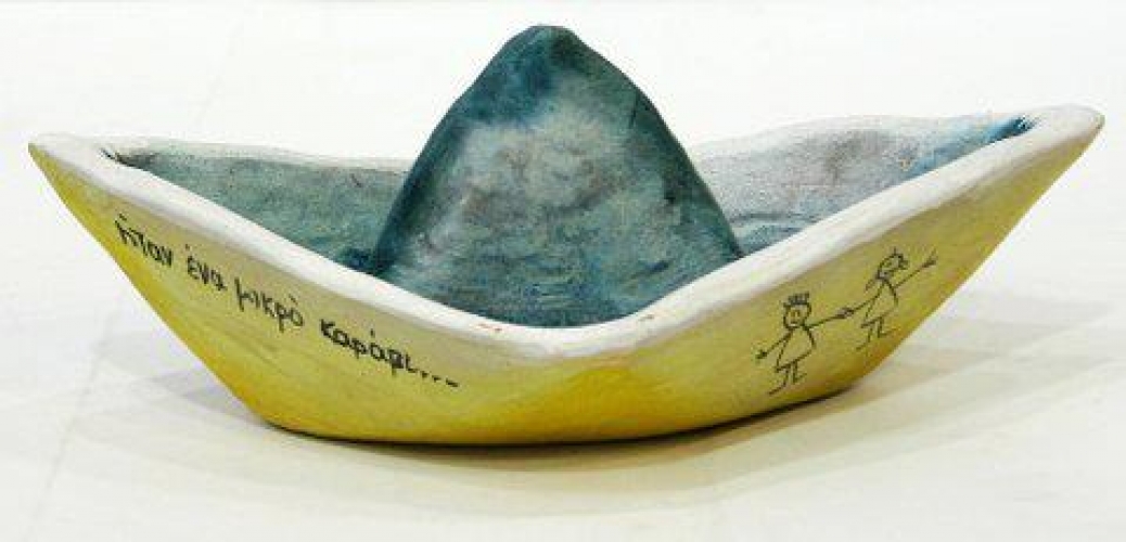 Hand-painted ceramic boat.
