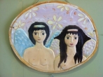 Hand-painted Ceramic Repousse plate.