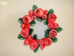 Hand-painted ceramic wreath.